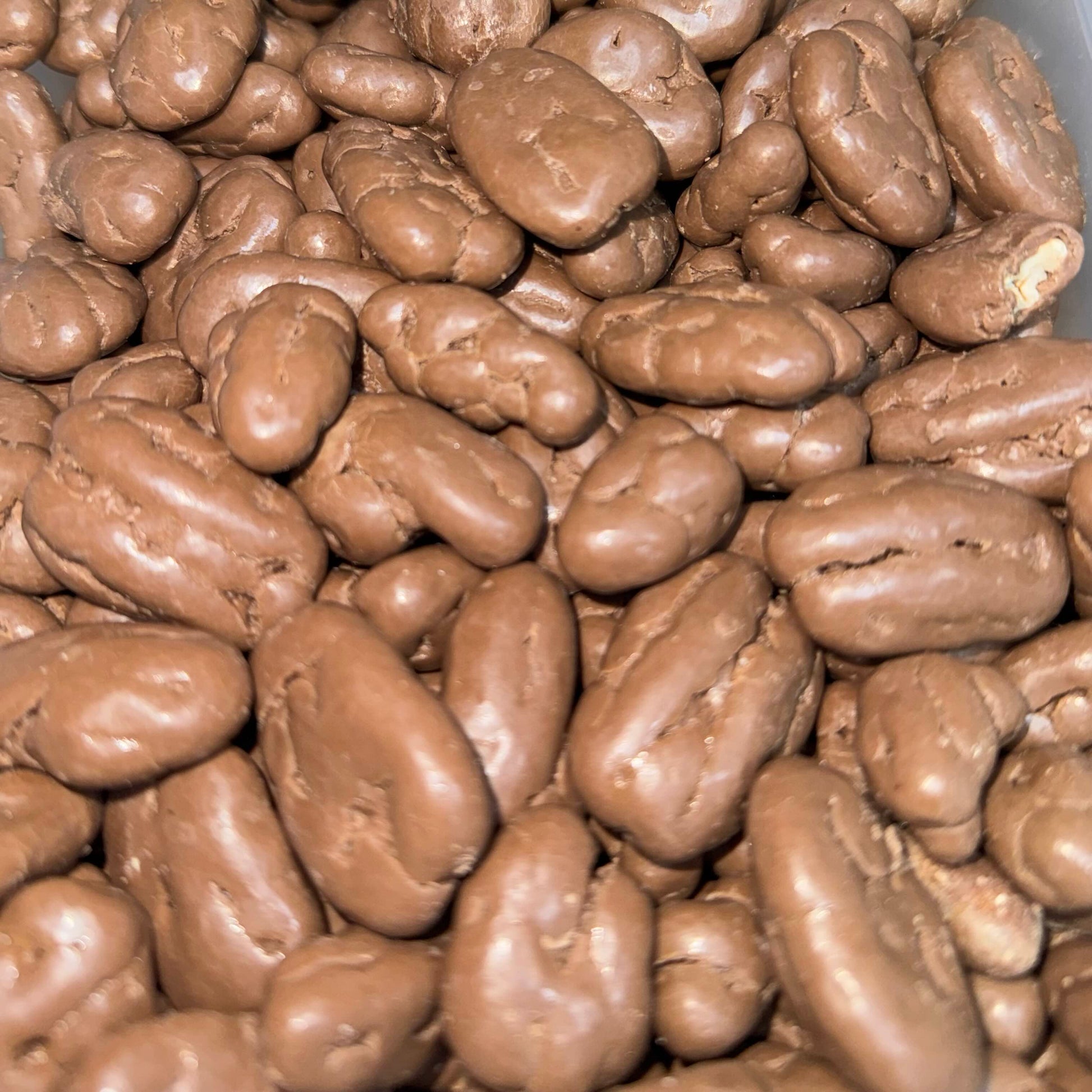 Noix de pécan enrobées de chocolat au lait