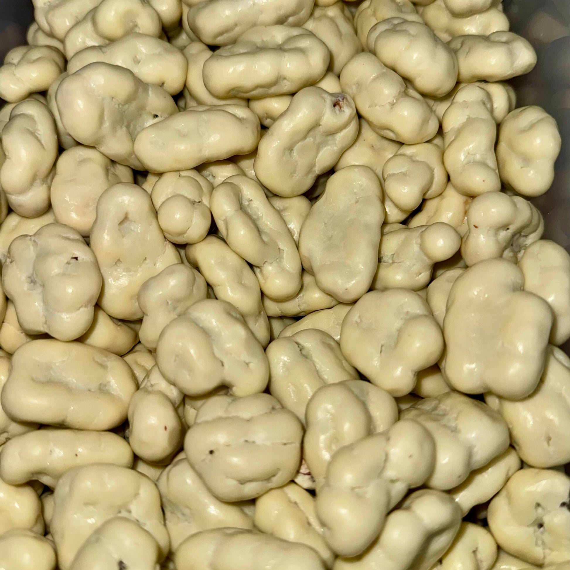 Noix de pécan enrobées de chocolat blanc